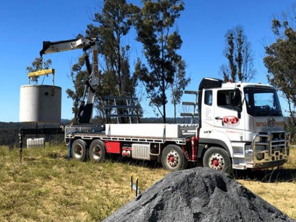 Truck Lifting Septic Tank — Concrete Products in Kyogle, NSW