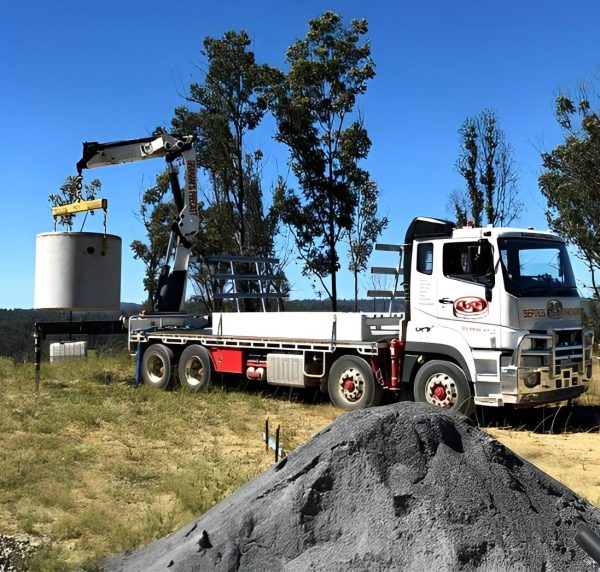 Truck Lifting Septic Tank — Concrete Products in Yamba, NSW