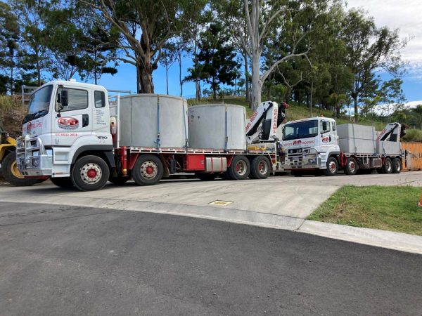 Truck Carrying Septic Tank — Concrete Products in Kyogle, NSW