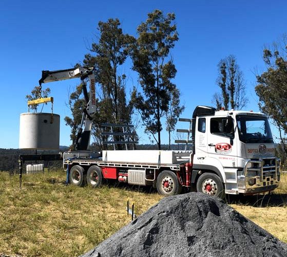 White semi truck loading decant tower — Concrete Products in Kyogle, NSW
